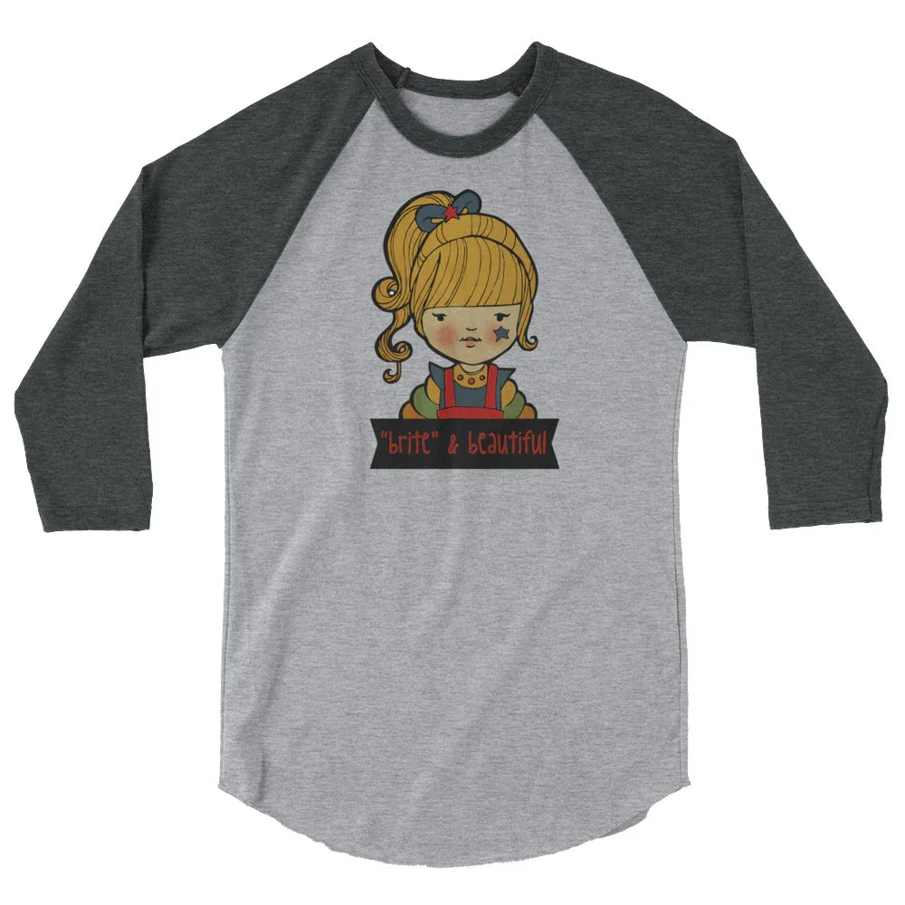 Gray raglan shirt with cute illustrated blonde girl, star on cheek, and 'brite & beautiful' text.